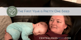 infant laying with mom