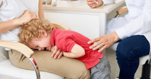 mom comforting screaming child