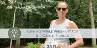 woman showing her bib over her pregnant belly running while pregnant