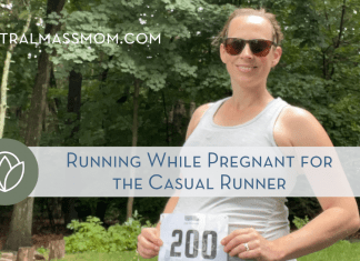 woman showing her bib over her pregnant belly running while pregnant