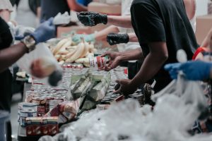 People sorting food at a food bank