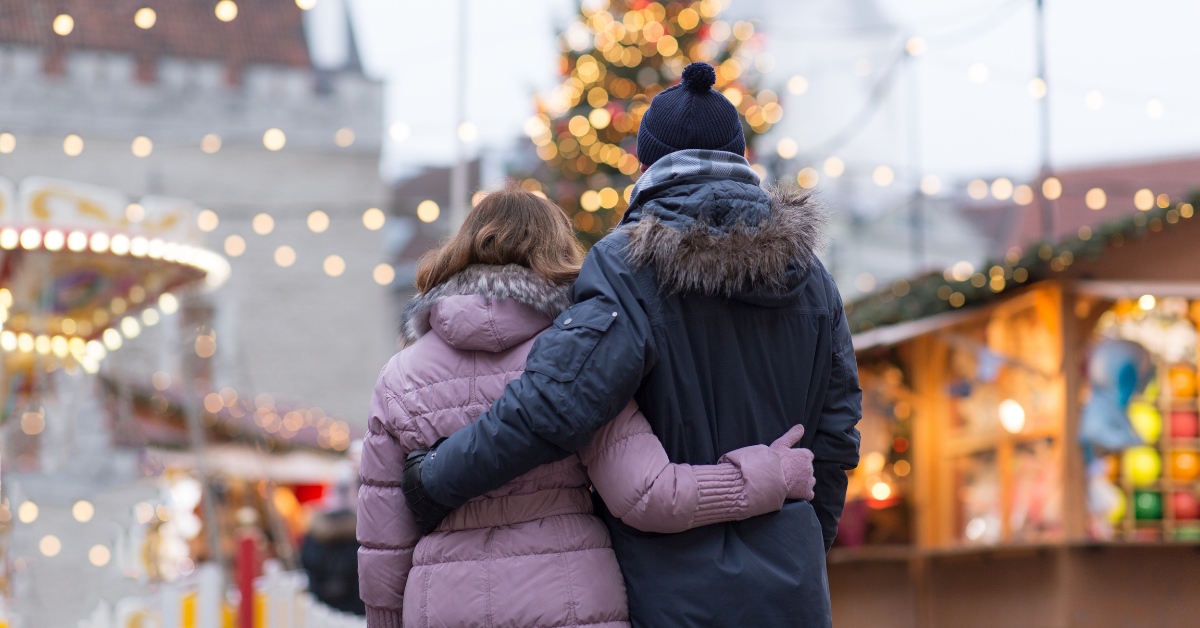 Navigating Infertility - Couple holding each other with their back to the camera