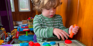 You're Less Alone Than You Think - Kid playing with playdough