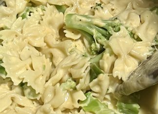A pot of creamy instant pot mac & cheese with broccoli