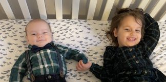 siblings holding hands, going from one child to two