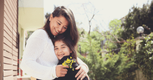 child hugging her mom to celebrate her every day
