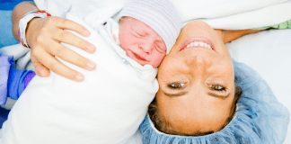 What is a Gentle C-Section? mom with baby during a gentle c-section