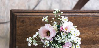 coffin with flowers on it - what I wish I could tell you
