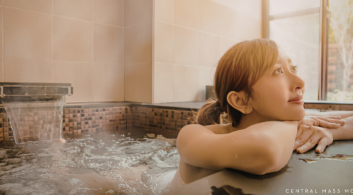 woman sitting in a hot tub relaxing